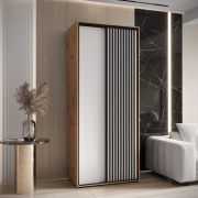 1,2 Meter breiter Schiebetürenschrank Mina in Weiß/Eiche, Front aus laminierter Platte, Anti Staubbürsten, Lamellen in schwarzer Optik, platzsparend