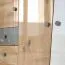 Drehtürenschrank / Eckkleiderschrank Sirte 02, Farbe: Eiche / Weiß / Grau Hochglanz - Abmessungen: 190 x 87 x 87 cm (H x B x T)