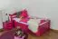 Kinderbett / Jugendbett "Easy Premium Line" K1/2h inkl. 2. Liegeplatz und 2 Abdeckblenden, 90 x 200 cm Buche Vollholz massiv rosa lackiert