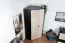 Jugendzimmer - Drehtürenschrank / Eckkleiderschrank Aalst 02, Farbe: Eiche / Creme / Schwarz - Abmessungen: 190 x 90 x 90 cm (H x B x T)