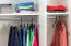 Großer Kleiderschrank | 6 Drehtüren | 4 Schubladen | 8 Fächer | mit 4 Kleiderstangen | 277 cm breit | Farbe: Weiß Abbildung