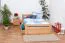 Holzbett 120 x 200 cm Buche massiv Natur Abbildung