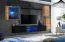 Stylische Wohnwand Volleberg 45, Farbe: Eiche Wotan / Schwarz - Abmessungen: 140 x 250 x 40 cm (H x B x T), mit LED-Beleuchtung