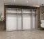 Kleiderschrank / Drehtürenschrank Korab 108, Farbe: Kaschmir, 3 Meter breit, vier Kleiderstangen, Soft-Close, zwei Spiegeltüren, Griffe: Schwarz, vier Fächer