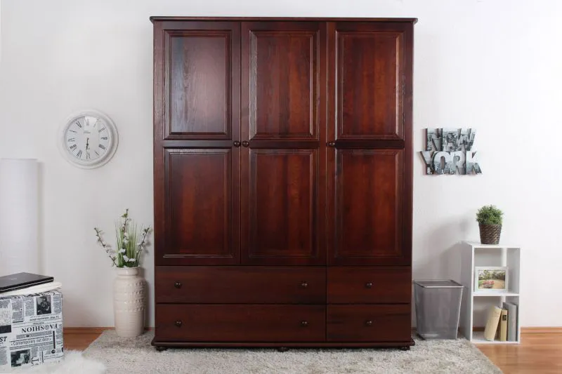 Kleiderschrank | 3 Drehtüren | 4 Schubladen | 4 Fächer | mit Kleiderstange | 154 cm breit | Massivholz | Farbe: Walnussfarben Abbildung